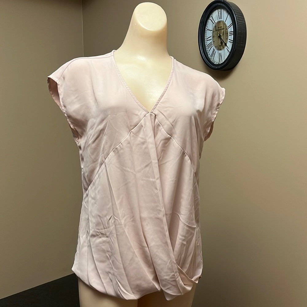 Pink blouse.
